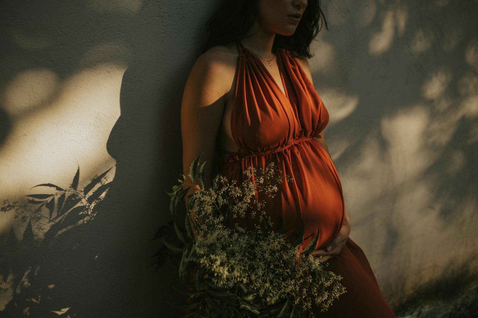 woman standing by the wall