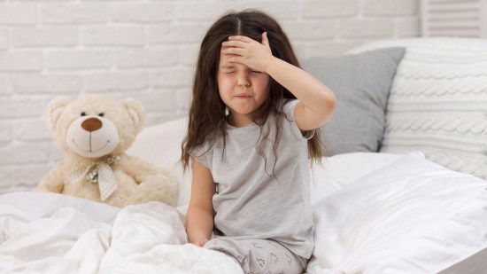 niño dolor de cabeza