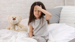 niño dolor de cabeza