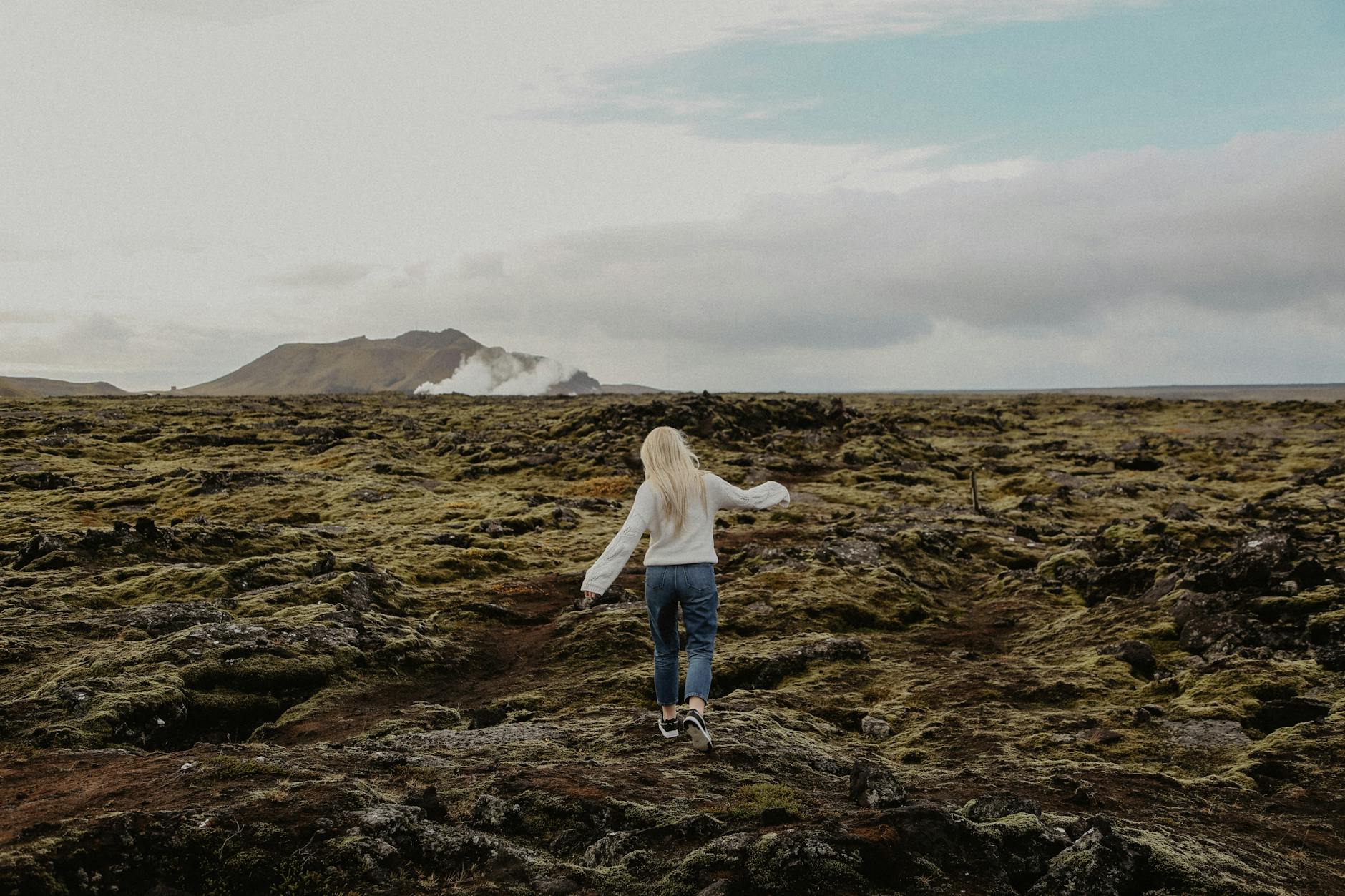 back view of a woman walking outdoors