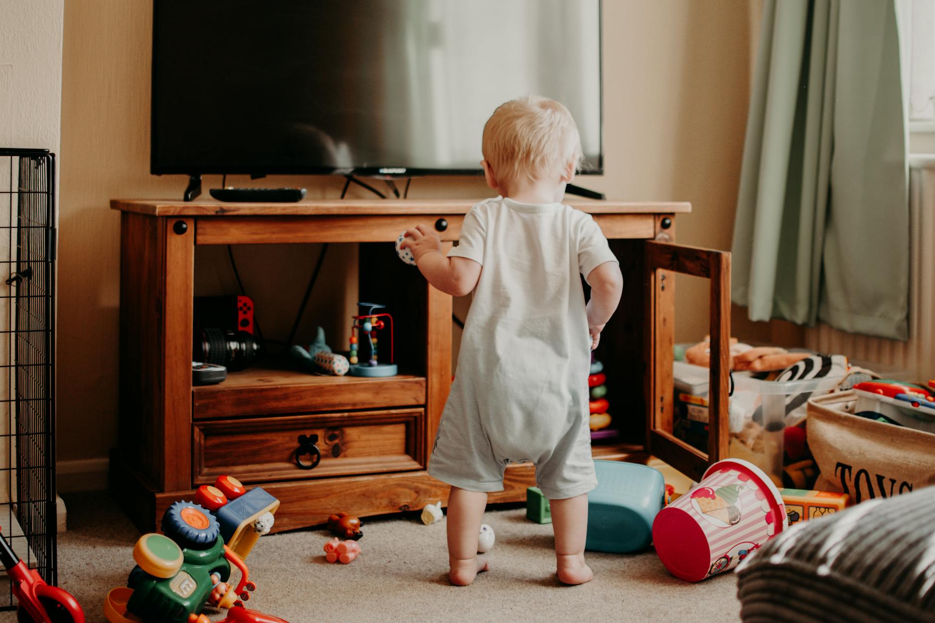 a toddler playing with in the room
