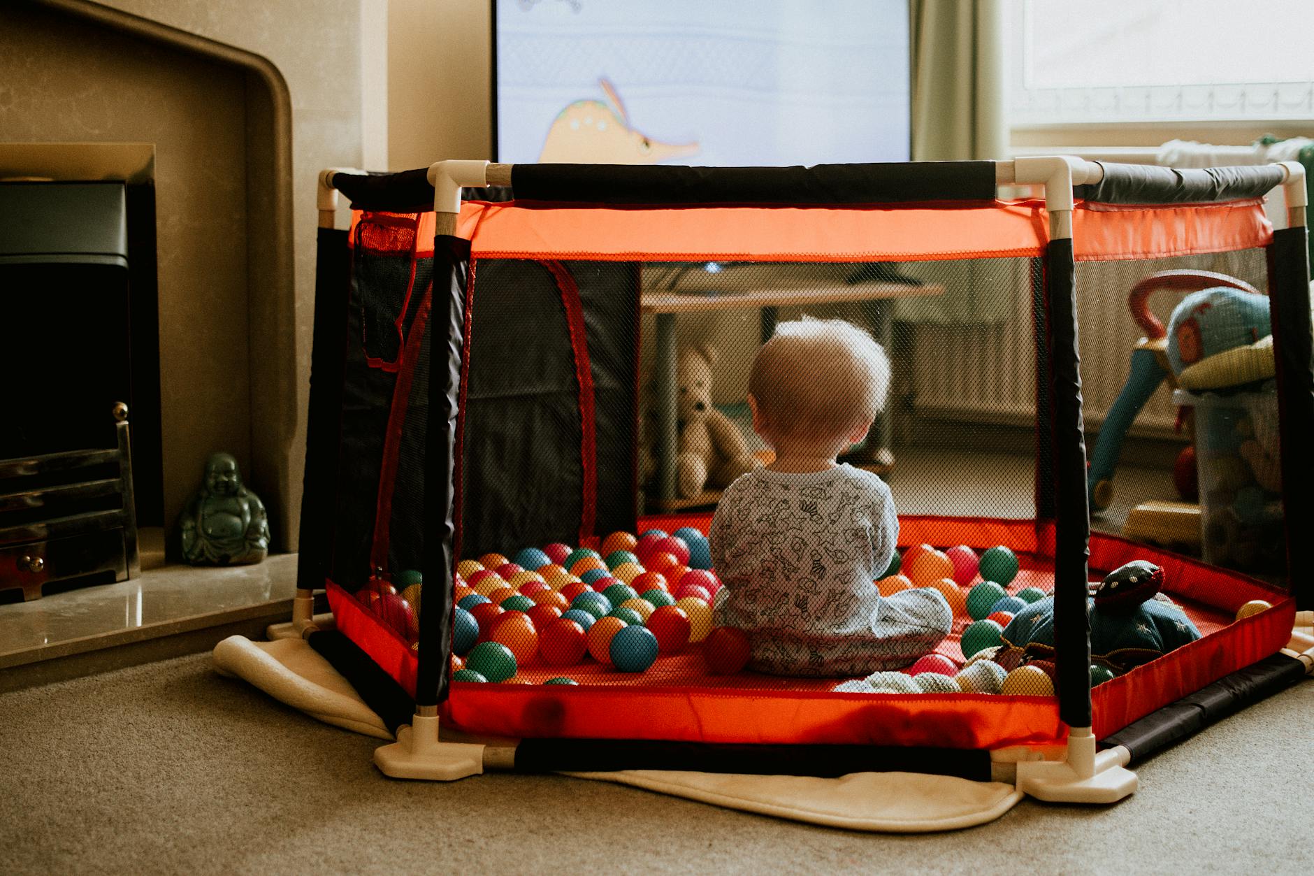baby in a ball pit