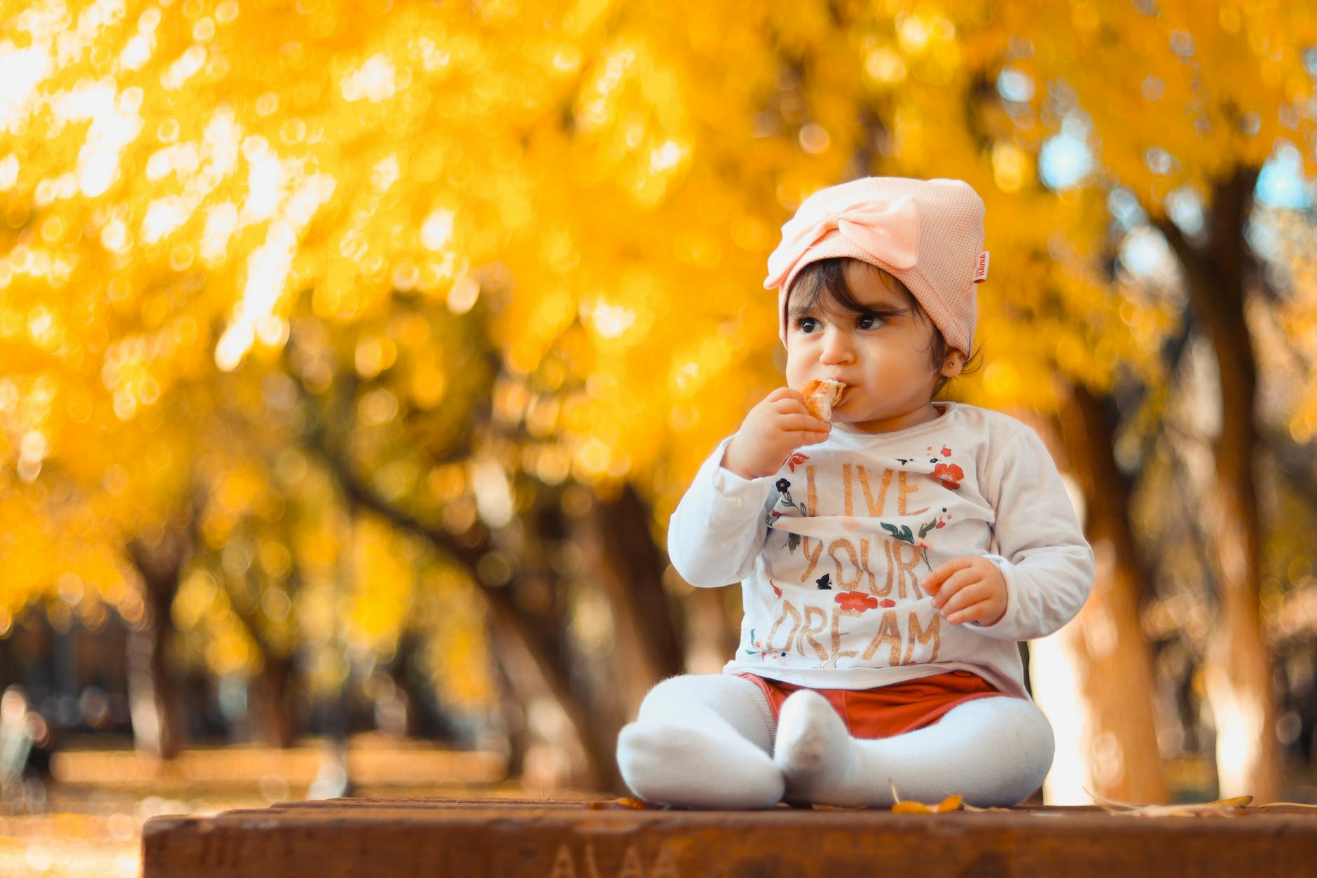 baby sitting on top of table