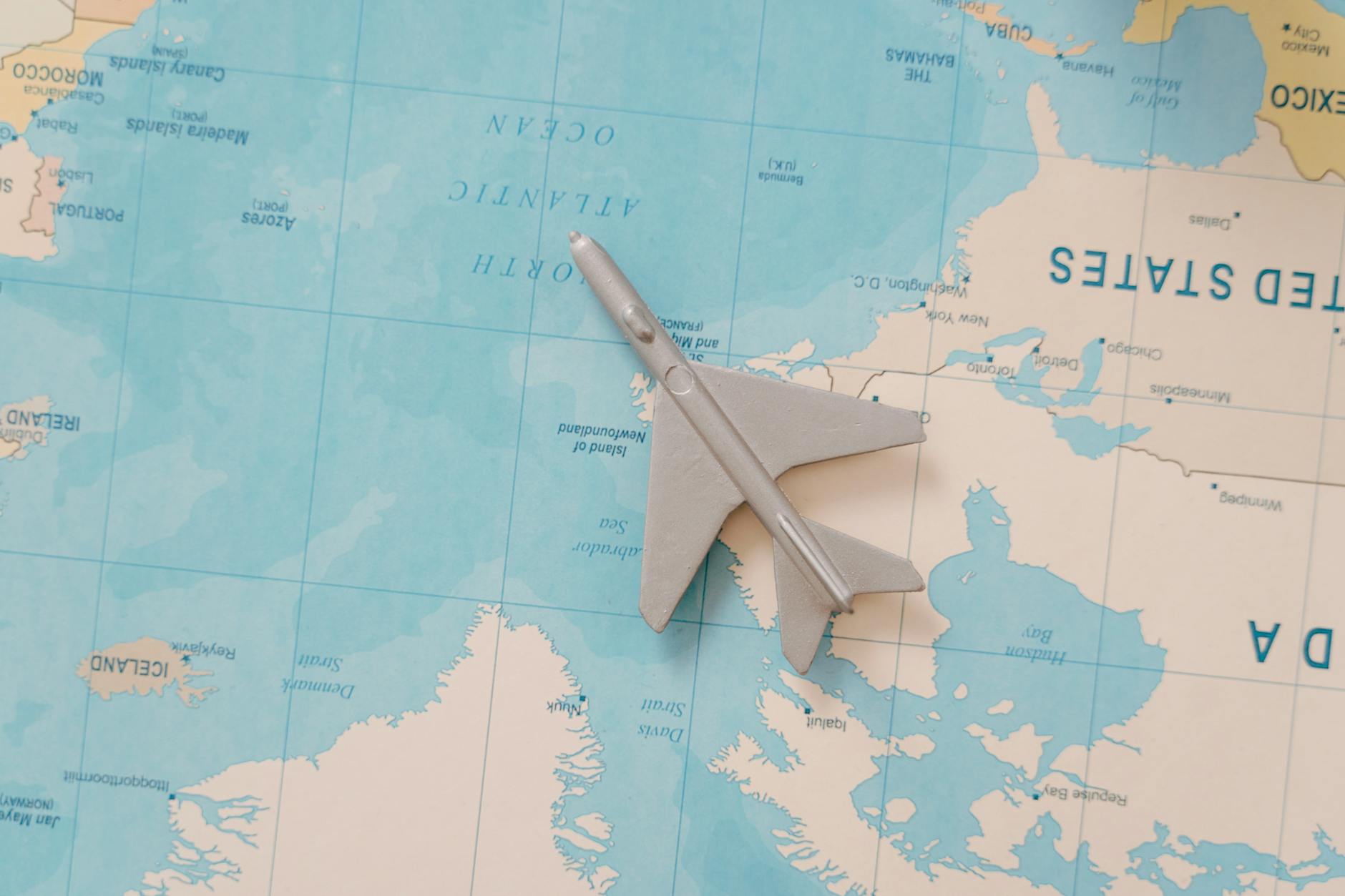 airplane toy on a map