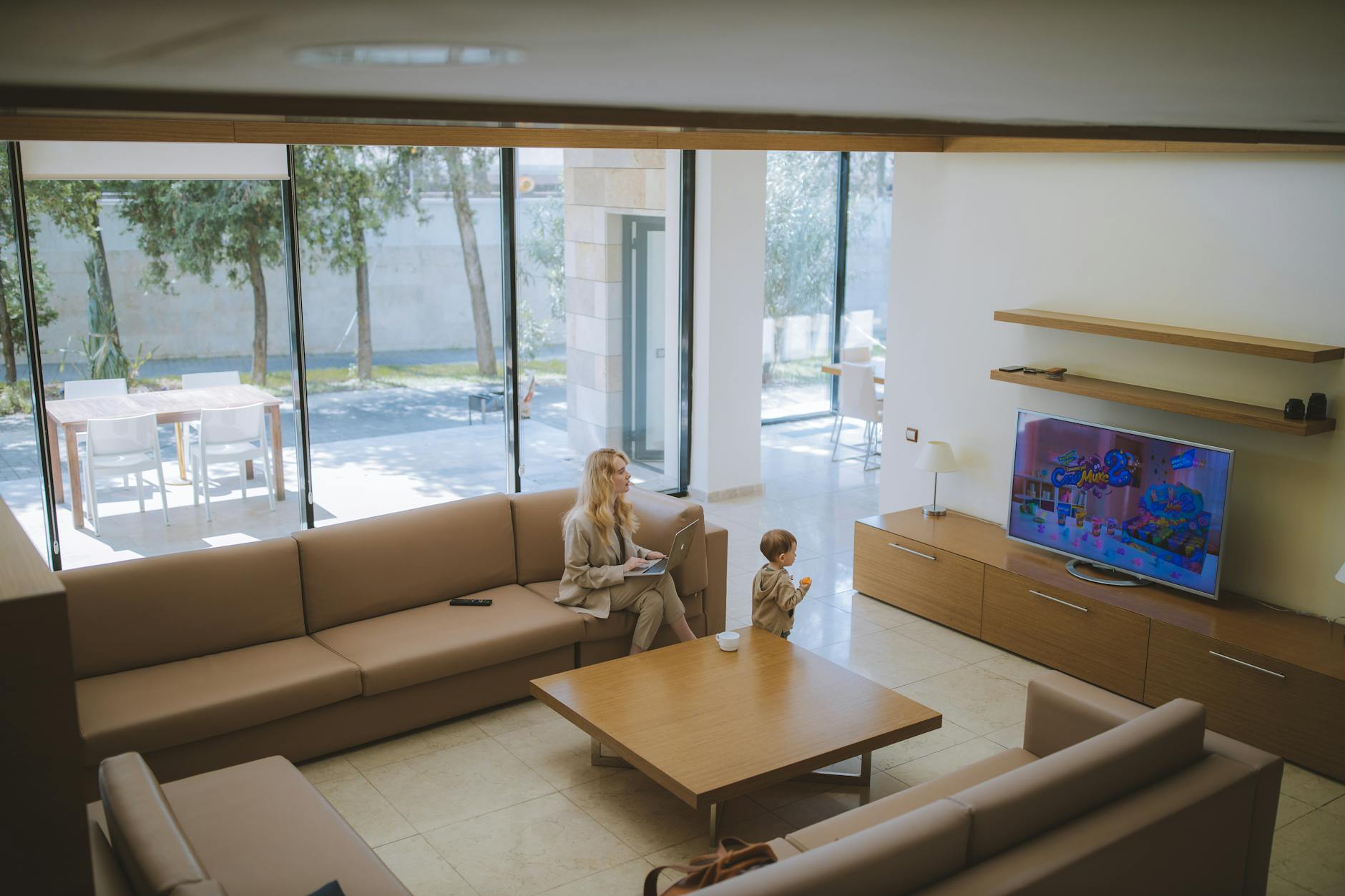 woman and child watching television