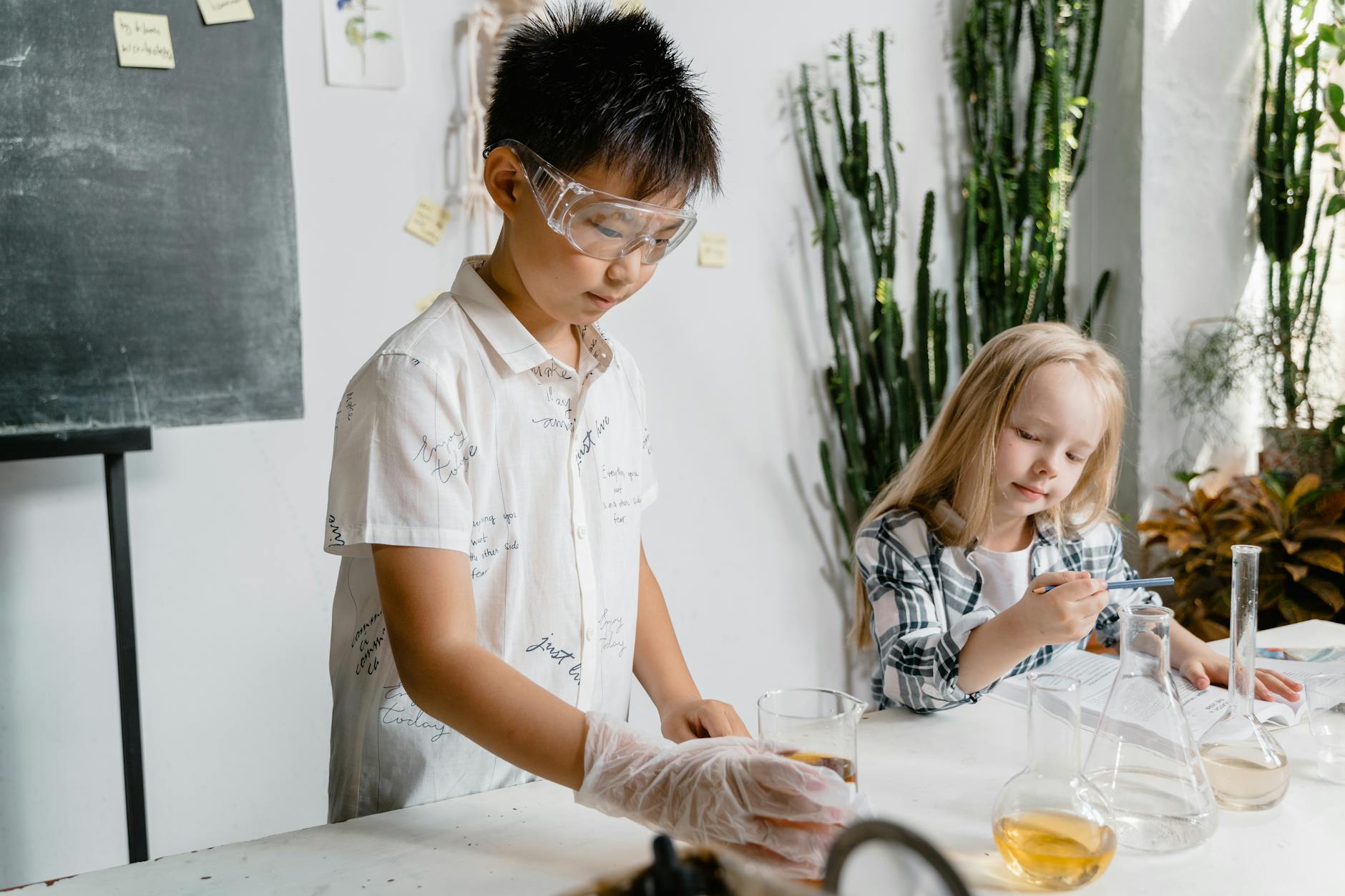 students experimenting using laboratory equipment inside the laboratory