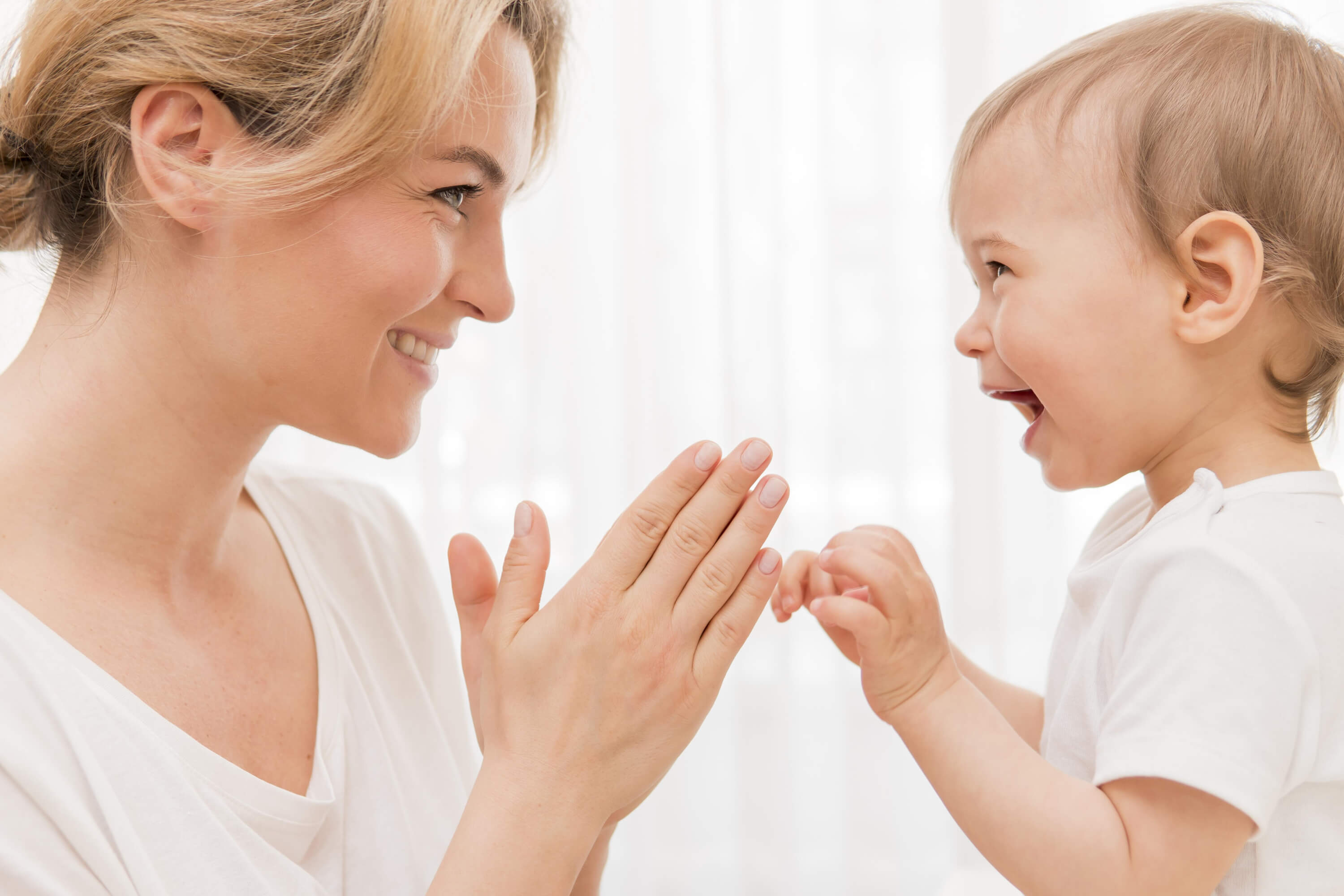 mid-shot-happy-mother-baby-having-fun