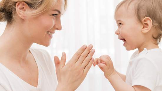 mid-shot-happy-mother-baby-having-fun
