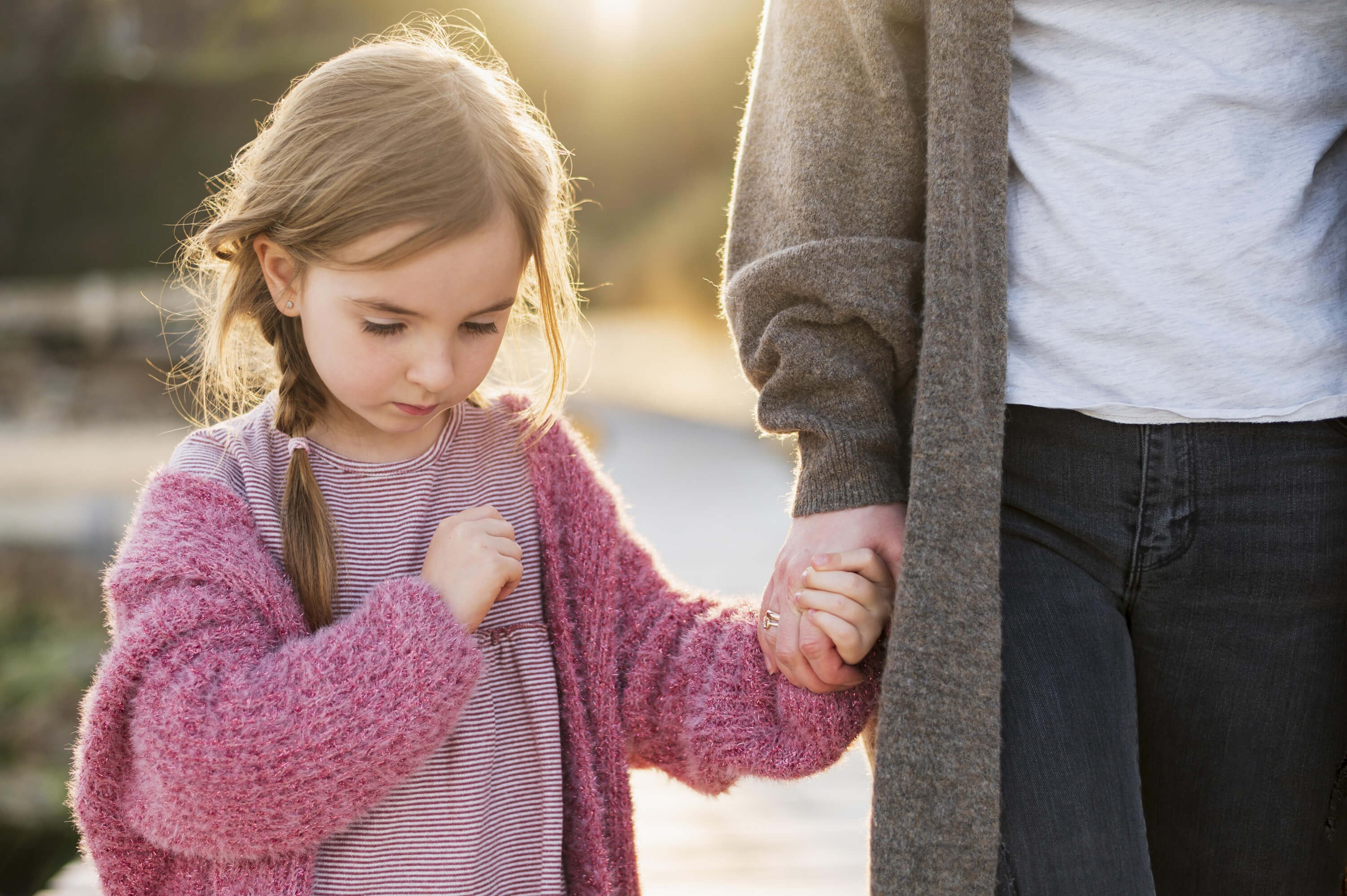 lovely-daughter-mother-holding-hands