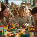Una docente acompaña el aprendizaje de un grupo de niños mientras construyen con LEGO en el aula.